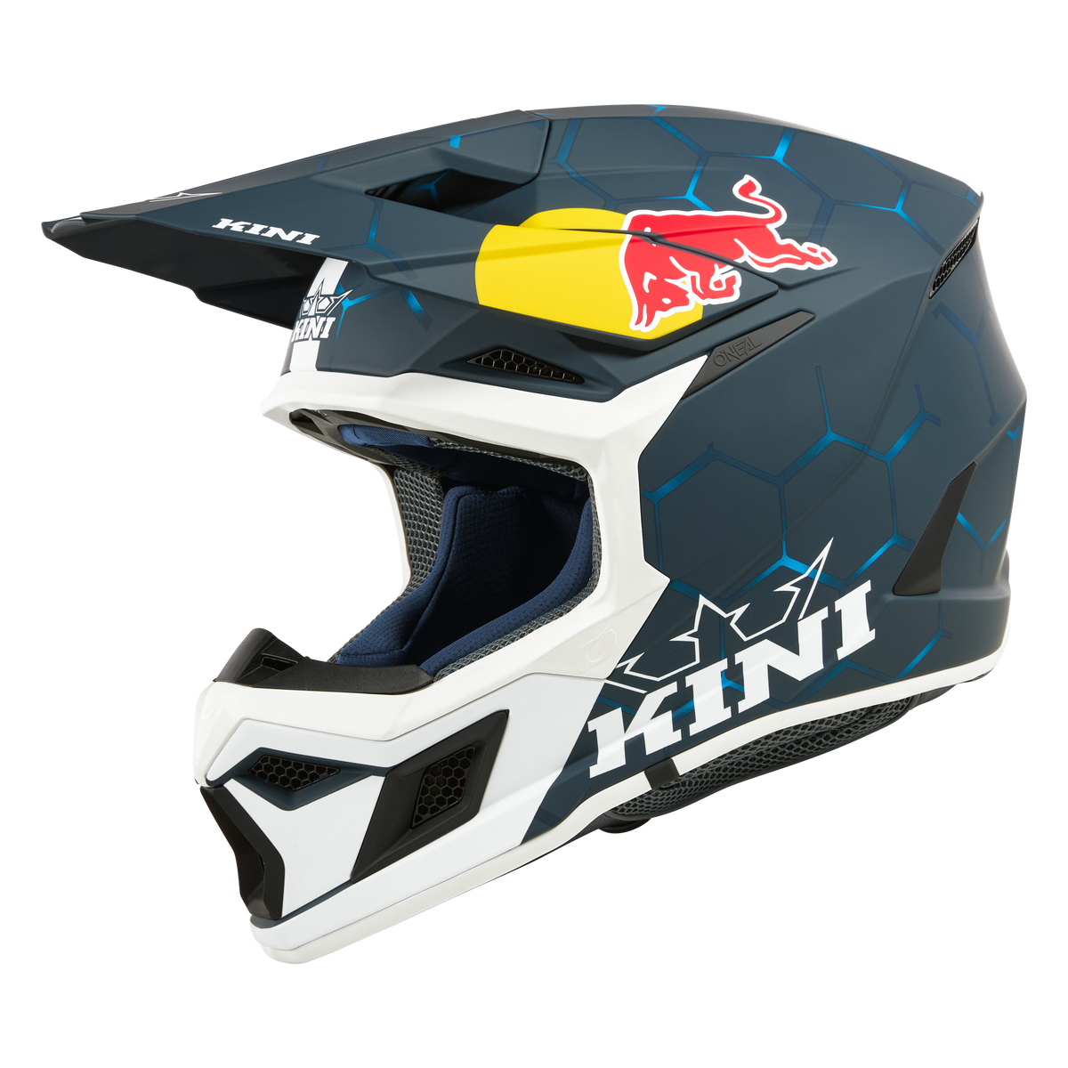 Der KINI RED BULL MX3 Helm 1.0 von Kini Red Bull verfügt über blaue und weiße geometrische Muster, ein Red Bull-Logo an der Seite, ein "KINI"-Branding auf dem Kinnschutz und dem Visier sowie ein Airflaps-System für Komfort im Gelände.