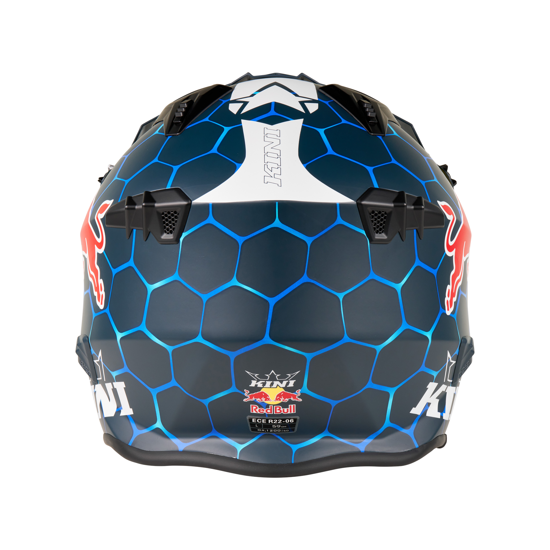 Der KINI RED BULL XDR 1.0 Helm von Mission Kini ist ein blauer Motorradhelm mit einem sechseckigen Muster, Red Bull Logos auf beiden Seiten, "KTM" auf der Rückseite und schwarzen Belüftungsöffnungen oben und in der Mitte.