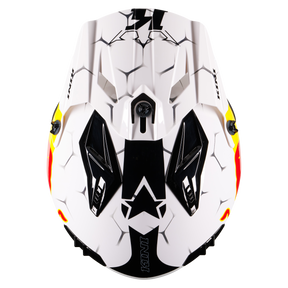 Draufsicht auf den Mission Kini KINI RED BULL XDR 1.0 Helm in Weiß mit schwarzen geometrischen Mustern, Sterndesign, gelben und roten Seitenakzenten, eckigen Lüftungsschlitzen und einem modernen, sportlichen Look.
